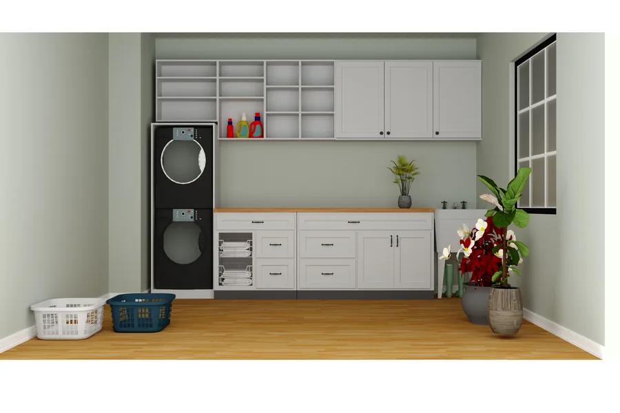 Laundry room with a stacked washer and dryer, white shaker cabinets, butcher block counter and open cubbies